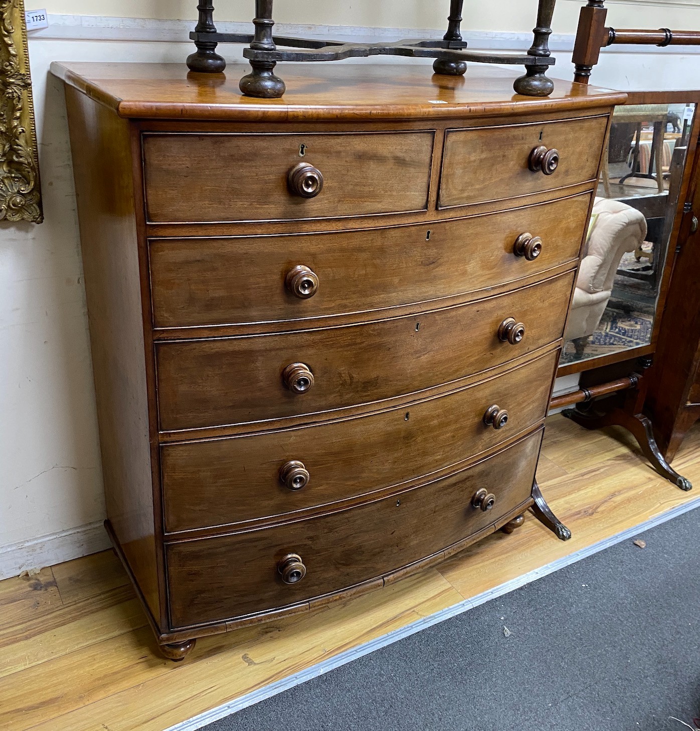 A Victorian mahogany bow fronted chest of two short and four long drawers, width 115cm, depth 55cm, height 127cm